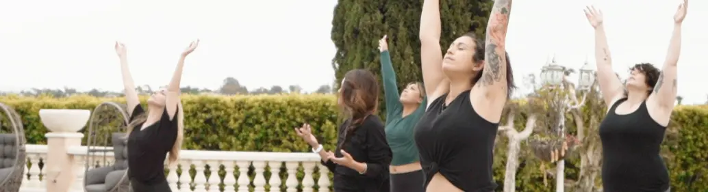 Villa Oasis residents during a yoga therapy session