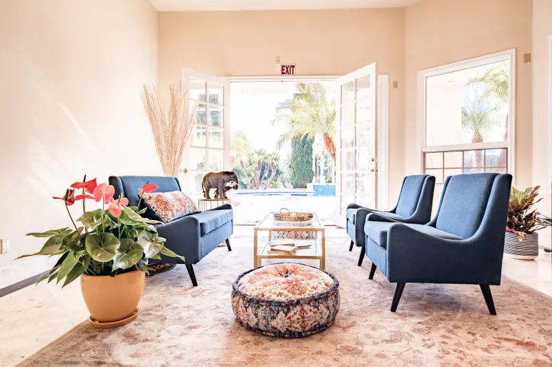 Villa Oasis common room with beautiful light coming through the double doors